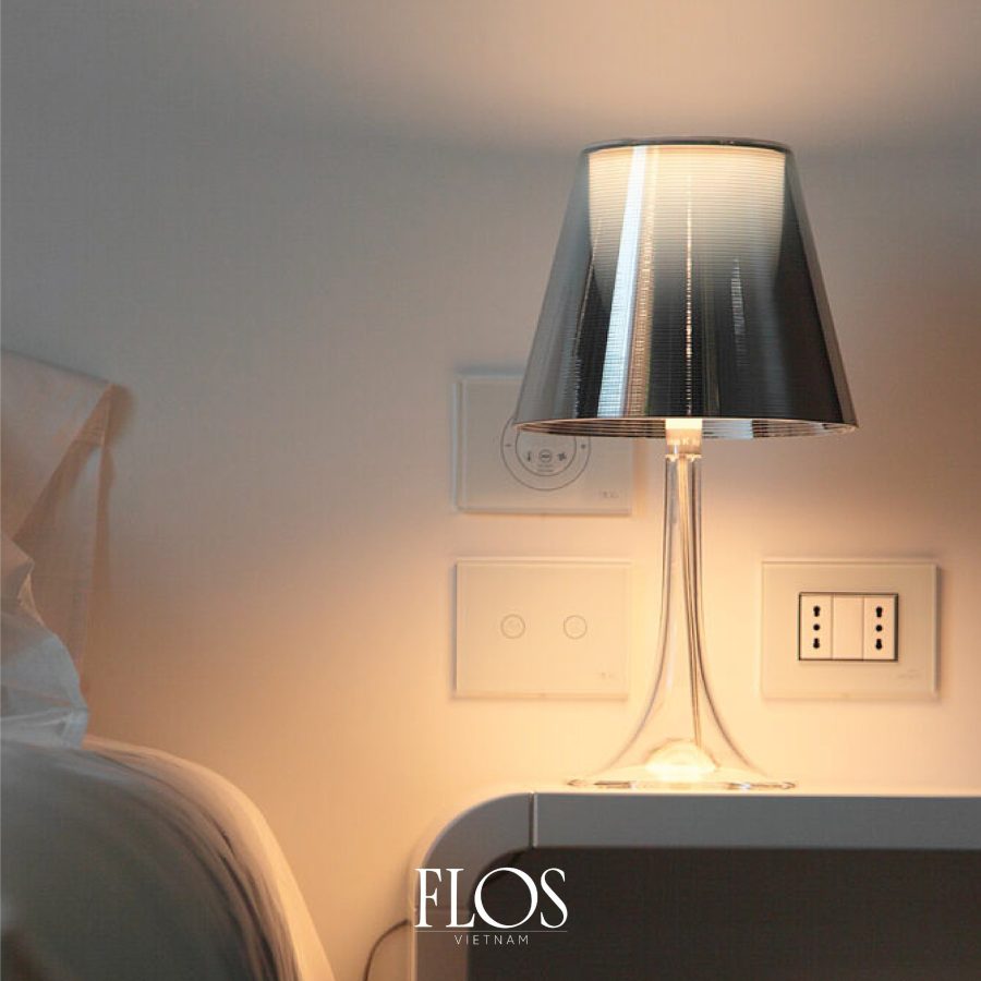 Miss K bedside lamp exudes a sense of aesthetic elegance and sophistication.